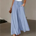 Elegant light blue high-waisted wide-leg palazzo pants featuring a drawstring waist and pockets - S / Bottoms / Blue