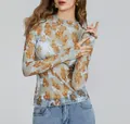 Detailed view of women's sheer floral mesh long sleeve top with intricate lace texture - S / Tops / Sky Blue