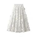Detailed view of the 3D floral mesh texture on this white high-waisted A-line skirt. - One Size / Bottoms / White