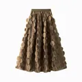 Detailed view of a brown mesh midi skirt featuring elegant 3D circular floral appliqués - One Size / Bottoms / Coffee