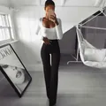 Slim fit high-waisted black flared yoga pants perfect for casual and professional wear - S / Bottoms / Black
