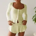 Detailed view of light yellow pointelle knit set with delicate lettuce edge hems. - S / Top And Bottom / Yellow