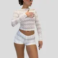 Close-up of white sheer lace long-sleeve crop top and matching shorts on model - S / Tops / White Stripe