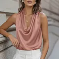 Detailed view of women's elegant pink satin sleeveless blouse with a soft cowl neck - Rose Gold
