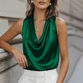 Detailed view of elegant emerald green satin sleeveless blouse with draped cowl neck. - Green