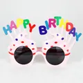 Detailed view of colorful cupcake-shaped birthday glasses with Happy Birthday text. - Pink Ice Cream Glasses