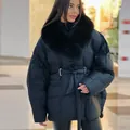 Elegant women's black thick puffer jacket with detachable fur collar and stylish waist tie - S / Tops / Black