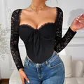 Top corsetto nero a maniche lunghe in pizzo con stecche e dettagli in rete trasparente. - Taglia S / Top (Con Ferretto Senza Imbottitura) / Nero
