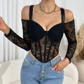 Close-up of a sexy black lace long-sleeved corset top with fishbone bodice and deep V-neck. - S / Tops / Black