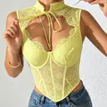 Close-up of a yellow floral lace corset top featuring a sexy cutout and tie-front neck detail. - Bright yellow