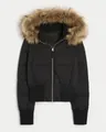 Black women's short puffer jacket with stylish faux fur hood and warm ribbed cuffs - S / Top (XTD3372) / Black