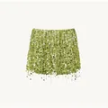 Detailed view of lime green sequin mini skirt featuring shimmering tassel fringe accents - S / Bottoms / Green