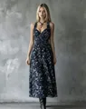 Full-length detail of a navy floral halter midi dress with a flattering V-neckline - XS / Dresses / Navy Blue