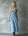 Full-length view of a V-neck floral midi dress showing the cinched waist and flowy fit. - XS / Dresses / Sky Blue