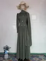 Green modest long-sleeve dress on mannequin with matching hijab and straw hat - S / Dresses / Green