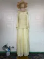 Detailed view of an elegant French style pleated yellow long sleeve maxi dress model - S / Dresses / Light Yellow