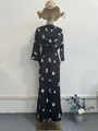 Elegante conjunto de dos piezas negro con estampado floral, top cuello redondo y falda - S / Top Y Pantalón / Negro