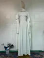 Full-length view of an elegant white dress with pearl-trimmed cape sleeves. - S / Dresses / White