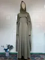 Front view of elegant olive green modest abaya dress featuring pearl trim and matching hijab - S / Dresses / Olive Green