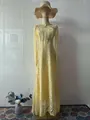 Detail showing the intricate lace pattern of this Victorian-style yellow maxi dress - S / Dresses / Yellow
