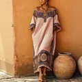 Detailed view of a Bohemian printed loose maxi dress perfect for a stylish women's vacation - S / Dresses / Pink
