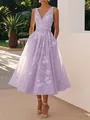 Detailed view of a lavender V-neck floral sleeveless midi dress for formal occasions - S / Purple