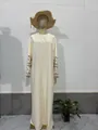 Elegant cream-colored Bohemian loose maxi dress featuring unique ethnic printed sleeves - S / Dresses / Milky White