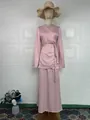 Elegant pink satin wrap-top and maxi skirt set displayed on a fashion mannequin - Pink