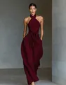 Detail view of an elegant burgundy linen halter neck wide-leg jumpsuit with a waist tie - XS / Burgundy