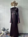 Detail view of an elegant purple long-sleeved maxi dress with corset waist - S / Dresses / Chestnut