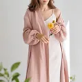 Close-up detail of soft pink crinkled gauze robe layered over white slip dress with flowers - S / Dresses / Rose Gold