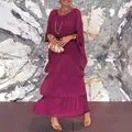 Close-up of a stylish magenta tiered dress set with a layered skirt and oversized sleeves - S / Top And Bottom / Rose Red