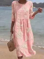 Close-up of a pink bohemian maxi dress with elegant white floral pattern print - S / Dresses / Pink Floral Print (Y-5)