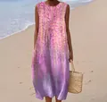 Detailed view of a sleeveless floral long dress featuring a vibrant pink and purple print - 4XL / Dresses / Pattern 22