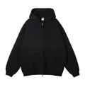 Platte weergave van een zwarte effen oversized hoodie met rits en kangoeroezak - XS / Tops / Zwart