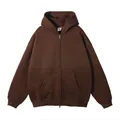 Bruine hoodie met rits, voorzak en geribde manchetten in een losse casual stijl - XS / Tops / koffiekleur