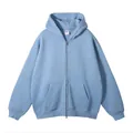 Vooraanzicht detail van een effen lichtblauwe oversized hoodie met rits - XS / Tops / Hemelsblauw