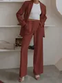 Completo due pezzi rosso mattone con blazer e pantaloni larghi a vita alta eleganti - rosso mattone