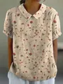 Close-up of casual floral print blouse with lapel collar and soft linen texture. - S / Tops / Beige Red Floral and Green Leaf (Pattern 18)