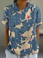 Close-up of a women's loose casual short-sleeved top with blue floral print and lapel - S / Tops / Creamy White (Dark Blue Plum Blossom)