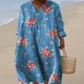Loose-fit blue floral V-neck maxi dress with long sleeves in a casual beach setting - S / Dresses / Multi-color 1
