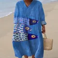 Detailed view of bohemian blue V-neck maxi dress with artistic fish print on beach - S / Dresses / Floral Print 3