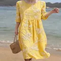 Relaxed-fit yellow midi dress featuring white floral print, round neck and half sleeves - S / Dresses / Yellow Floral (Y-28)