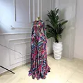 Detail view of a long-sleeved mesh maxi dress with vibrant tie-dye print pattern - S / Dresses / Rose Red