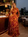 Elegant long-sleeved mesh maxi dress with vibrant geometric tie-dye print pattern - Orange