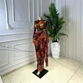 Vue détaillée d'une robe longue sexy en maille à imprimé floral. - S / Robes / Arc-en-ciel
