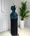 Elegant sleeveless tie-dye print maxi dress with a pleated black skirt. - S / Dresses / Blue