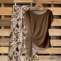 Macro view of the brown twist-knot short sleeve top and leaf print wide-leg pants set. - S / Top And Bottom / Dark Brown