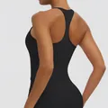 Detailed back view of a solid black racerback sports tank top for yoga and fitness sessions. - S / Tops / Black