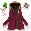 Burgundy women's winter parka featuring warm lambswool lining and a plush faux fur hood - M / Tops / Burgundy